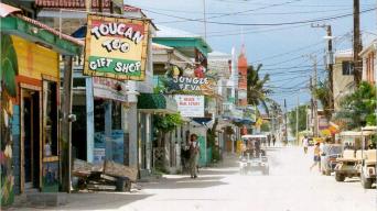 A dusty road lined with local shops